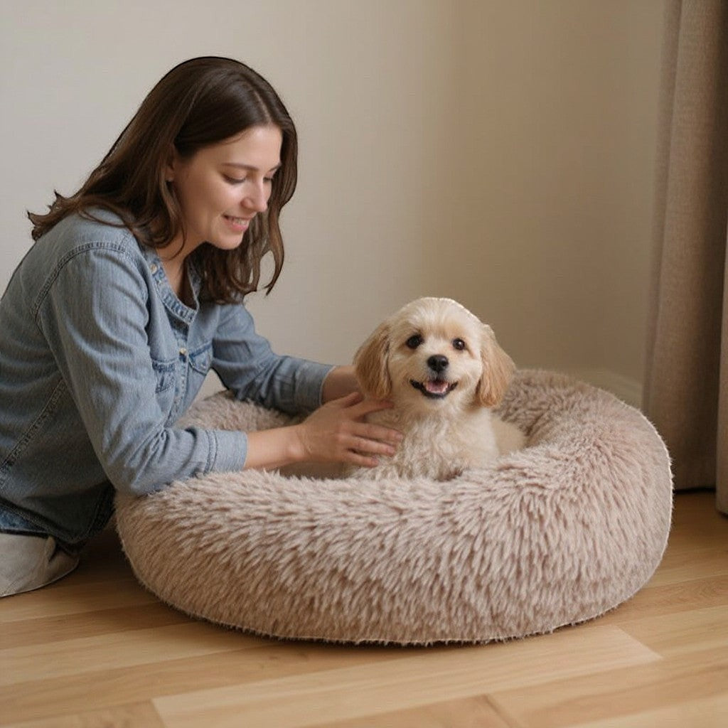 Animoo plush dog bed in beige, round, soft velvet material, washable and comfortable for ultimate relaxation.