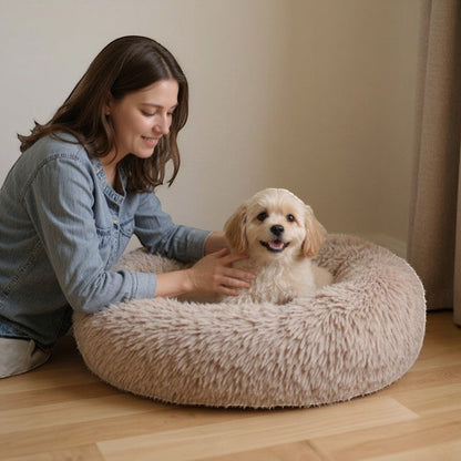 Animoo plush dog bed in beige, round, soft velvet material, washable and comfortable for ultimate relaxation.