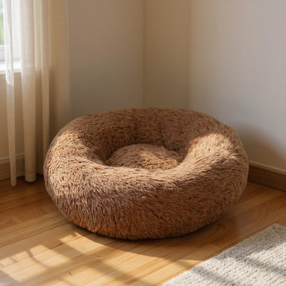 Animoo brown plush round dog bed, ultra-soft velvet material, washable and comfortable for ultimate pet relaxation.