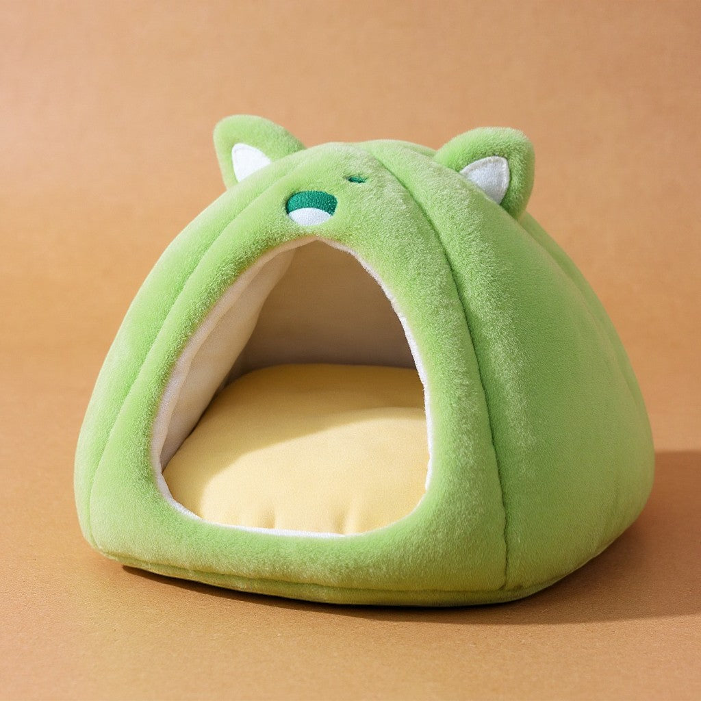 Animoo green plush cat and dog bed with cute animal face design and soft yellow cushion.