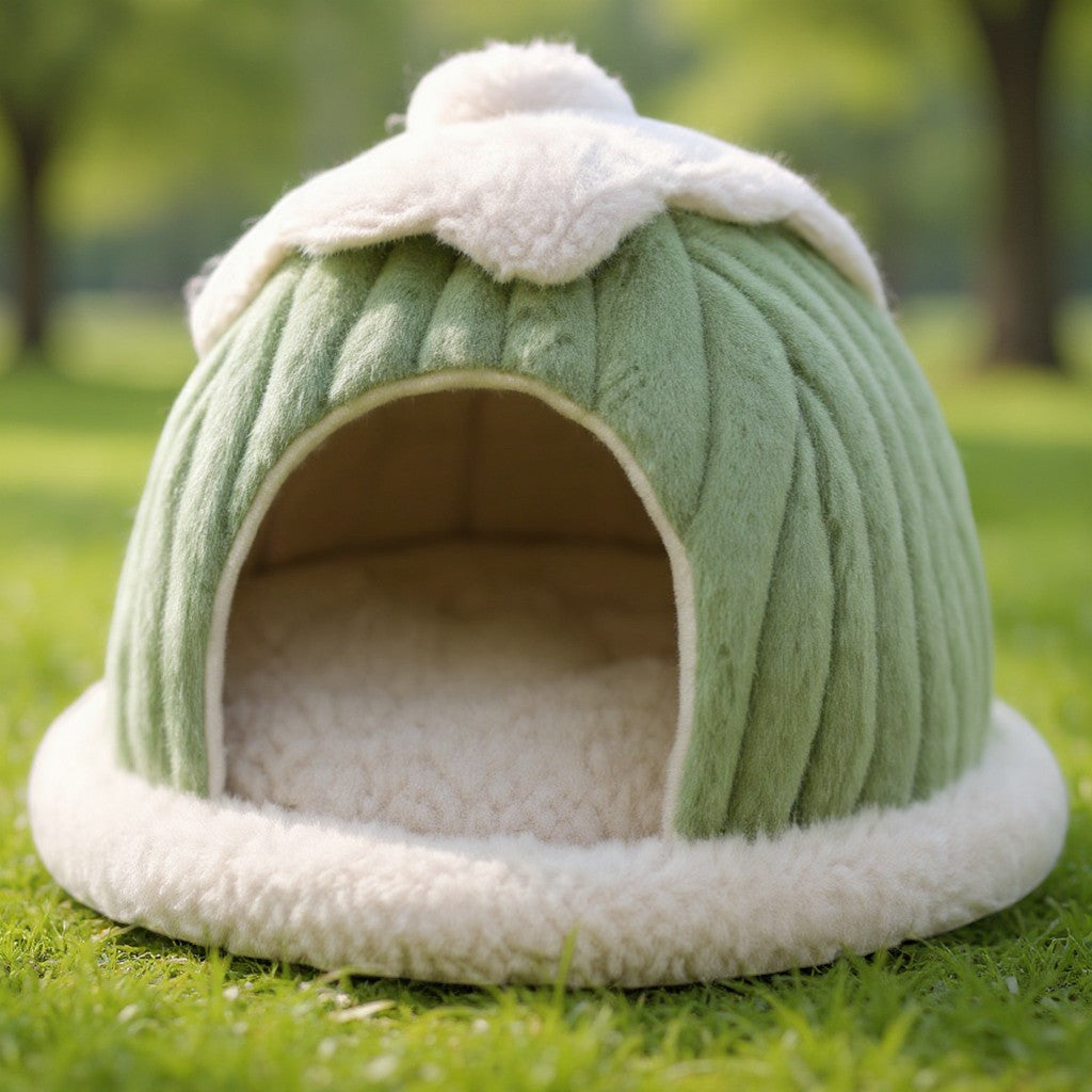 Animoo light green plush pet bed shaped like a cozy dome with white trim. Offers a warm, enclosed space for cats and small dogs.