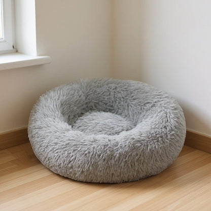 Animoo light grey plush round dog bed with raised edges for comfort and security. Washable velvet material.