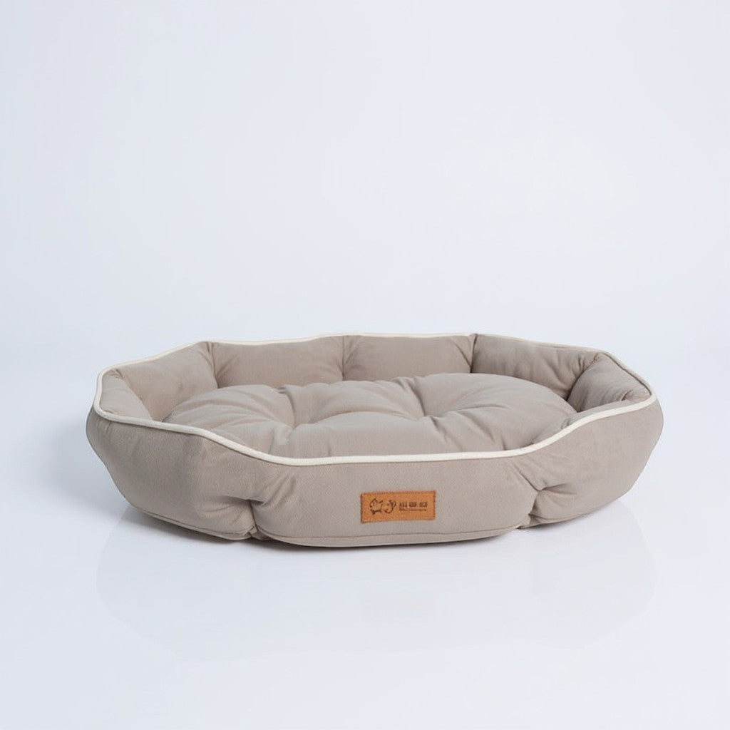 Animoo taupe suede effect dog bed with raised sides for a cozy feel. Plush filling for ultimate comfort.