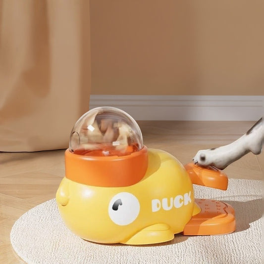 Animoo yellow duck-shaped interactive treat dispenser toy for dogs and cats, made of durable ABS plastic.